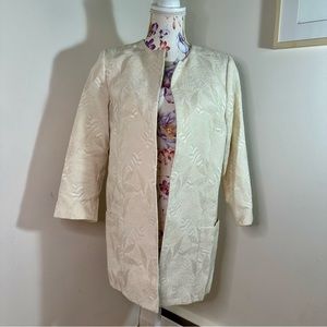 Botanical textured jacket with sparkly accents throughout